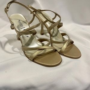 White House Black Market . Ladies heels size 7 Gold strappy . Great prom Shoe